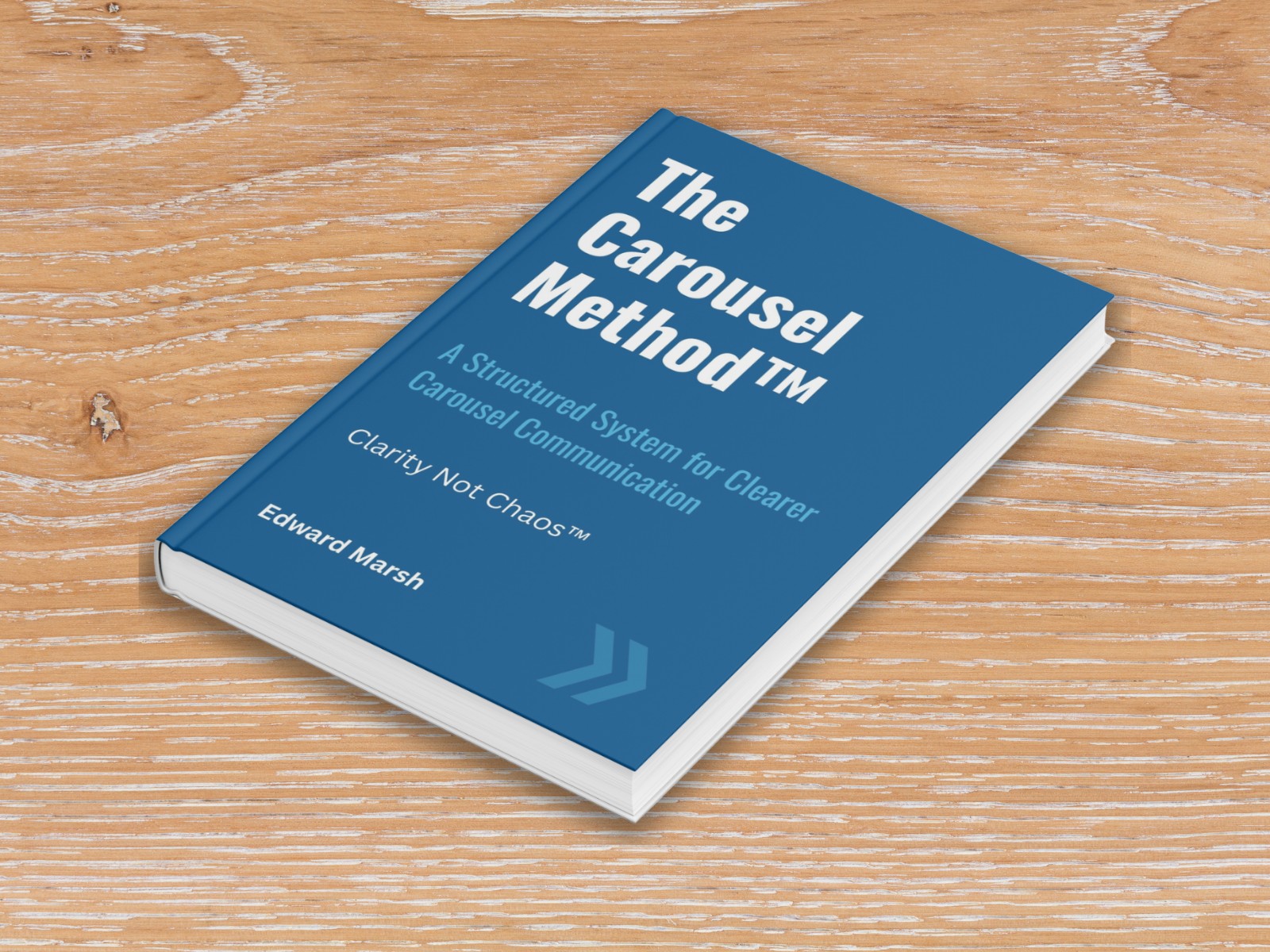 The Carousel Method book mockup on a desk
